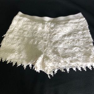 White lace shorts